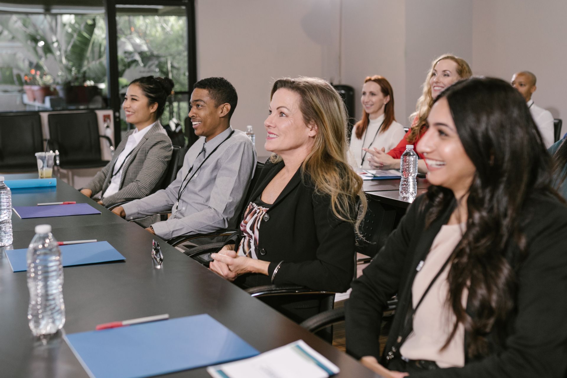 Professionals participating in a workplace training conference