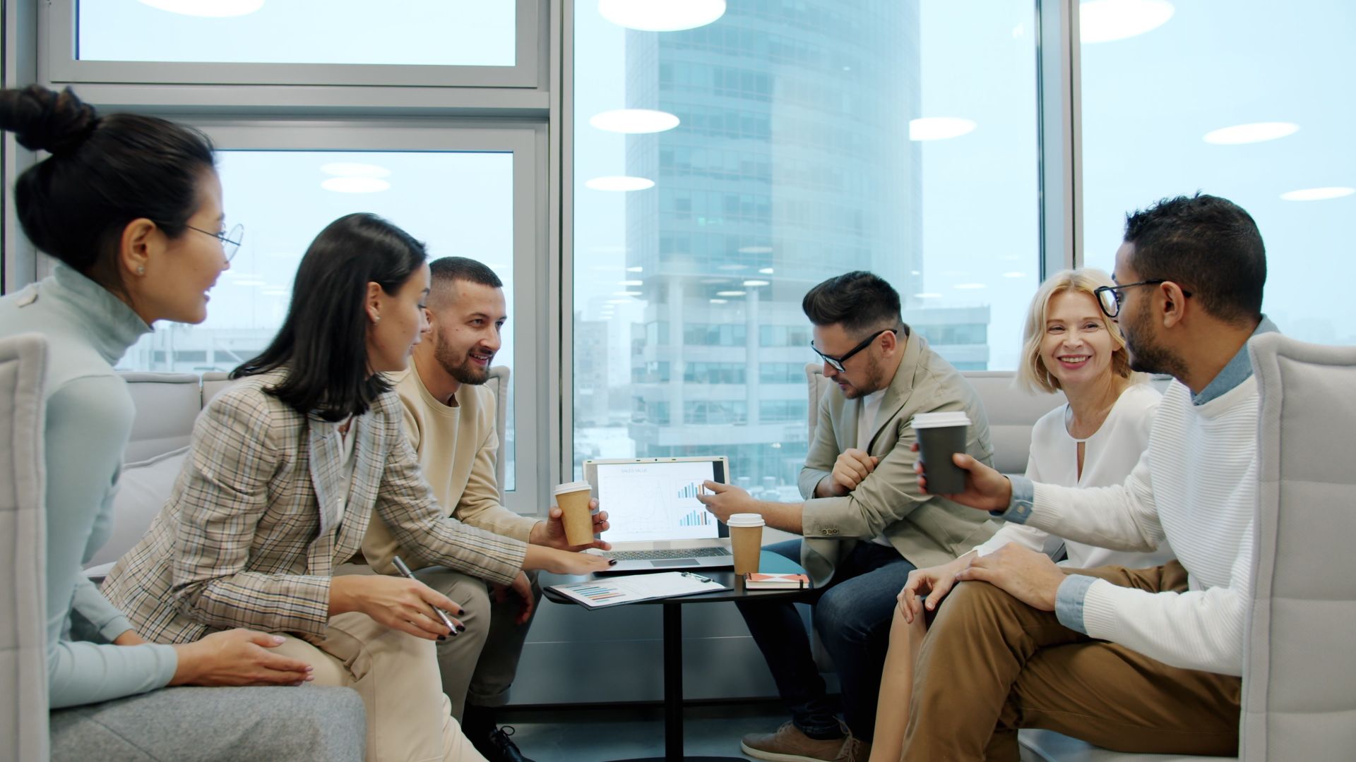 Colleagues discussing ideas together during a team meeting